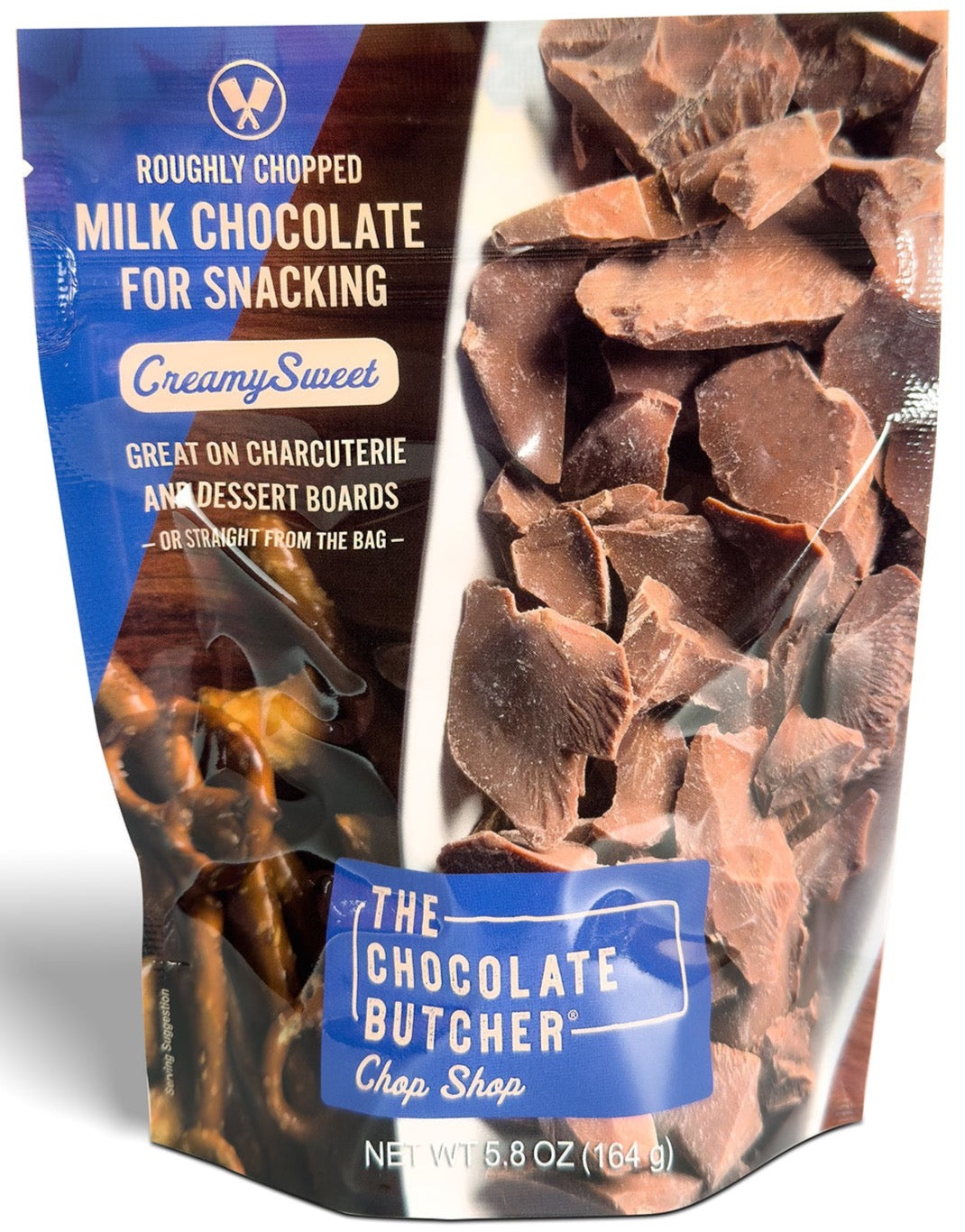 The Chocolate Butcher’s Milk Chocolate — Roughly Chopped offers creamy, chopped milk chocolate pieces—perfect for snacking or adding to a dessert board.